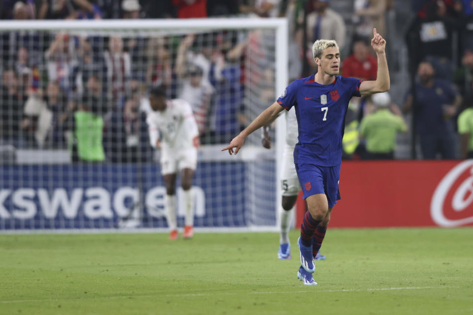 U.S. midfielder Gio Reyna (7) celebrates his goal against Trinidad and Tobago during the second half of the first leg of a CONCACAF Nations League soccer quarterfinal Thursday, Nov. 16, 2023, in Austin, Texas. (AP Photo/Stephen Spillman)
