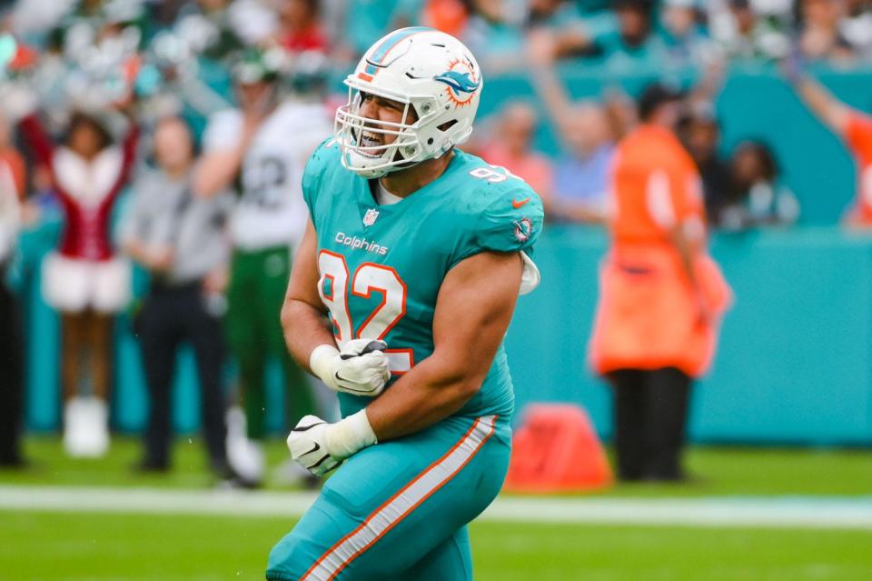 Miami Dolphins defensive end Zach Sieler (92) celebrates forcing a fumble and recovering the ball in the fourth quarter on Dec. 21 against the New York Jets at Hard Rock Stadium in Miami Gardens.