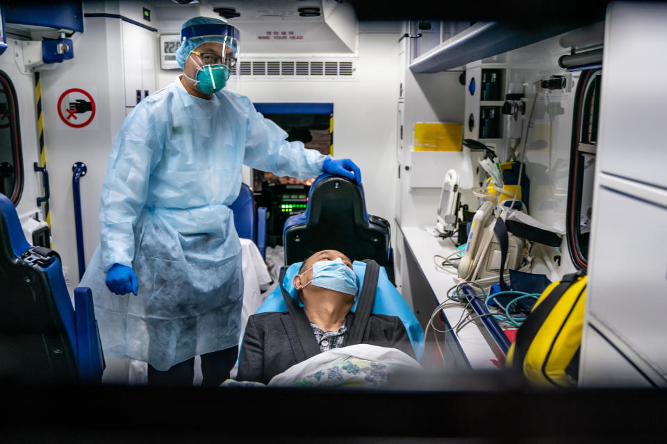 HONG KONG, CHINA - JANUARY 22: A patient is transferred by an ambulance to the Infectious Disease Centre of Princess Margaret Hospital on January 22, 2020 in Hong Kong, China. Hong Kong reported its first two cases of Wuhan coronavirus infections as the number of those who have died from the virus in China climbed to seventeen on Wednesday and cases have been reported in other countries including the United States,Thailand, Japan, Taiwan and South Korea. (Photo by Anthony Kwan/Getty Images)