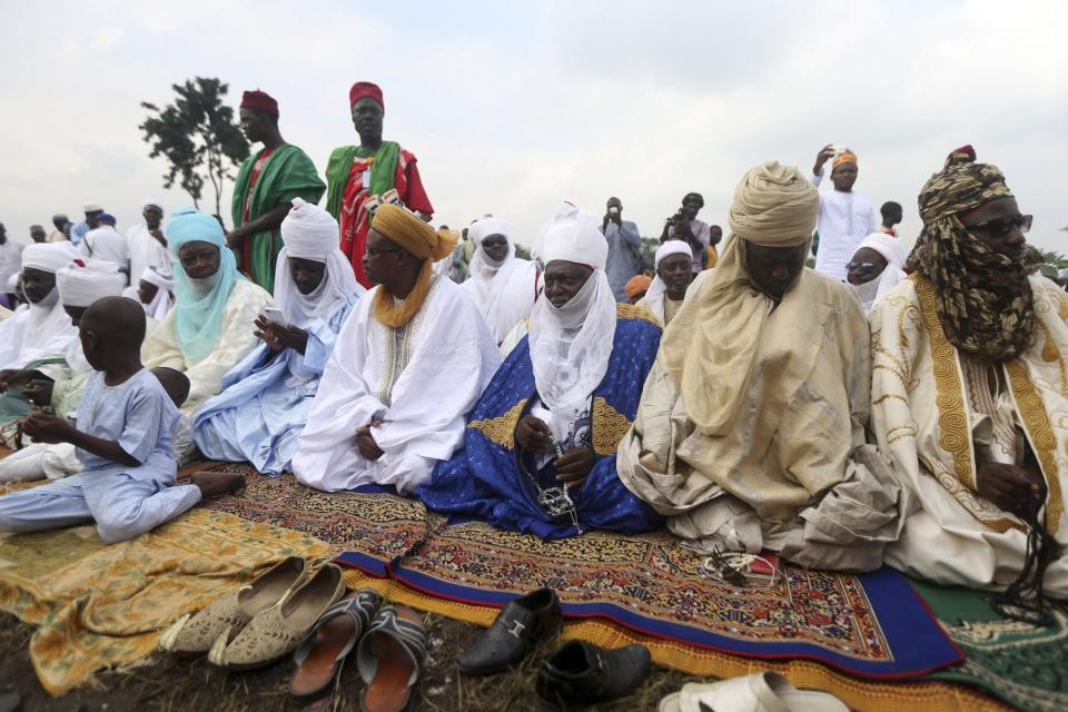Clerics lead prayers marking the Islamic festival of Eid al-Adha at an open field in Lagos