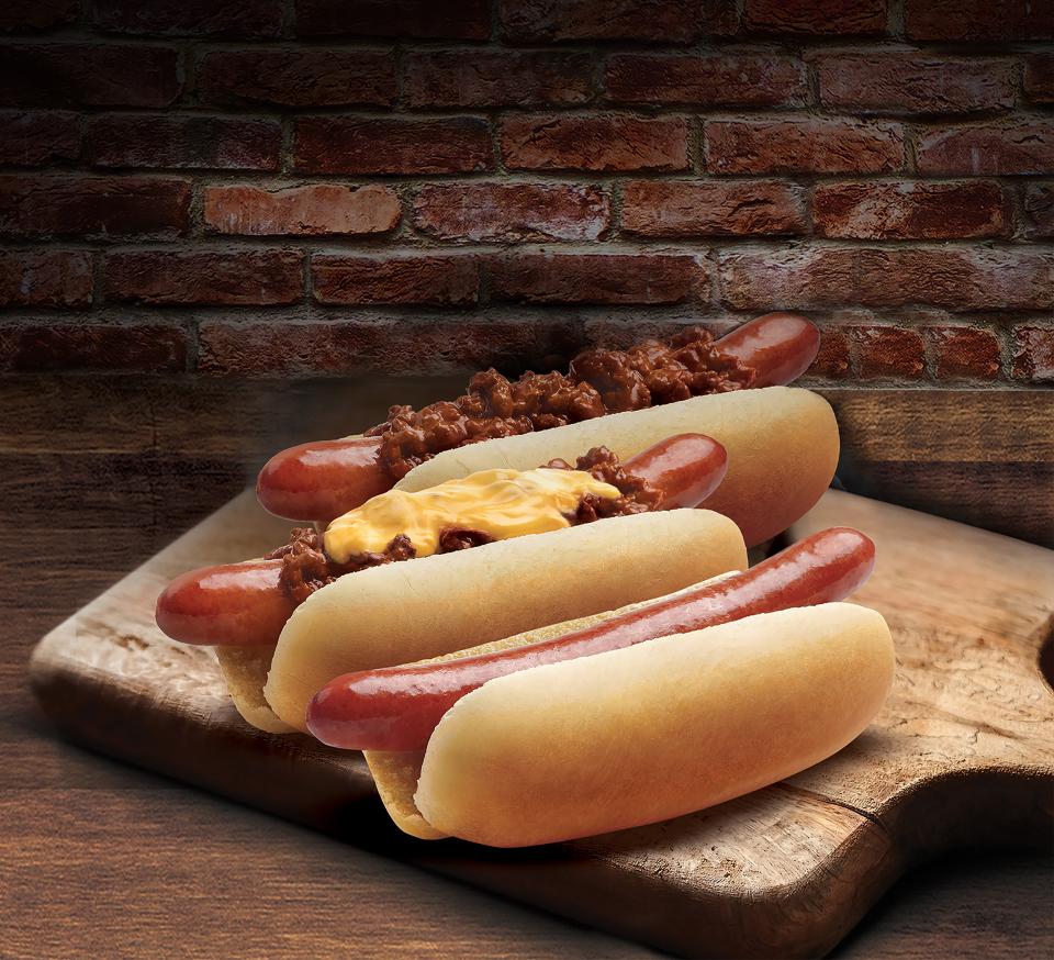 Nathan's Famous hot dogs can be topped with chili, cheese, diced onions, sauerkraut and bacon.
