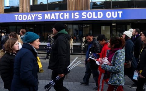 Fans arrive at the stadium ahead of the game - Credit: Getty images