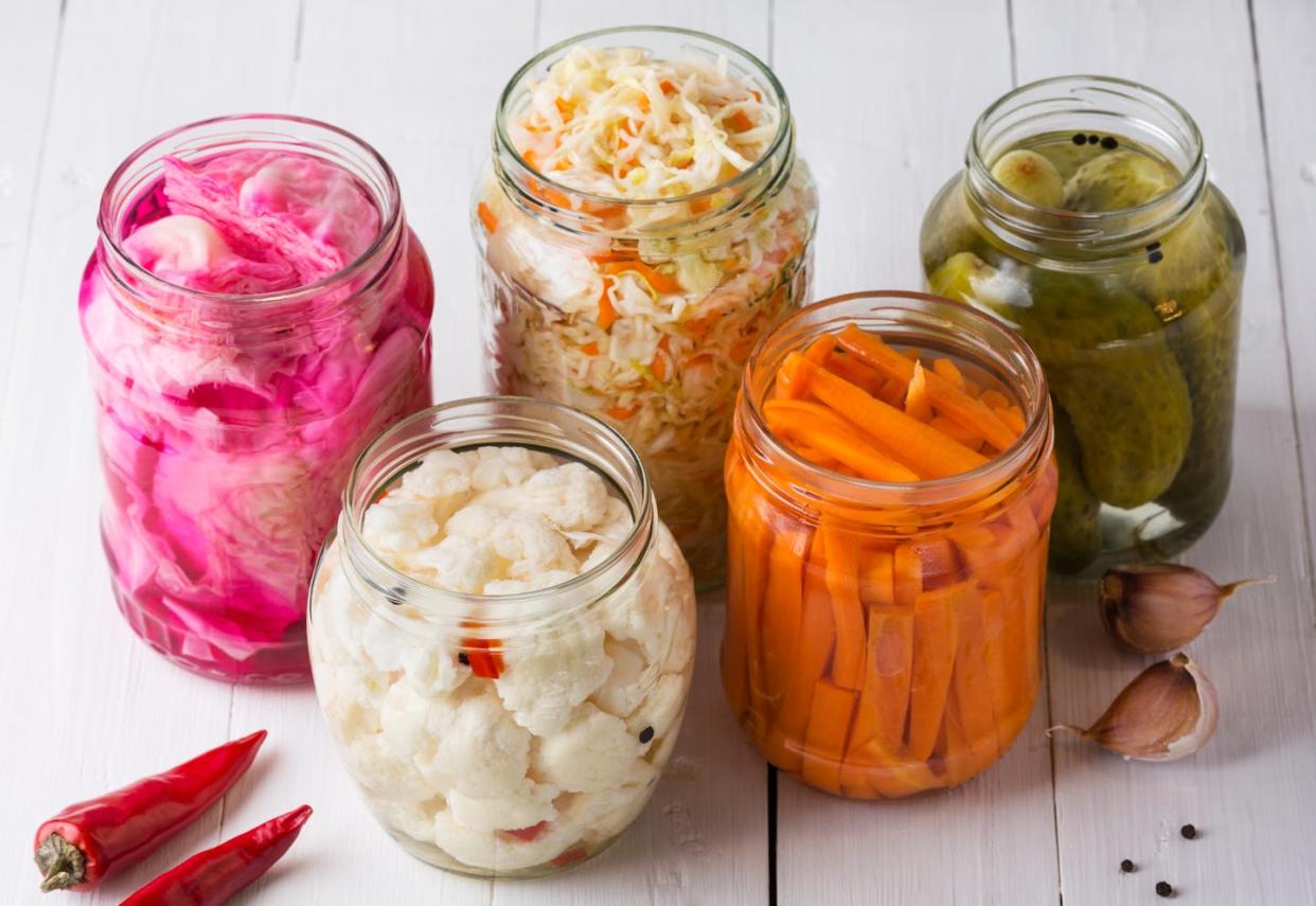 Fermented foods can be a good source of probiotics. <a href="https://www.gettyimages.com/detail/photo/fermented-vegetables-sauerkraut-with-carrots-and-royalty-free-image/1279140719?phrase=probiotic+food&adppopup=true" rel="nofollow noopener" target="_blank" data-ylk="slk:Yulia Naumenko/Moment via Getty Images;elm:context_link;itc:0;sec:content-canvas" class="link ">Yulia Naumenko/Moment via Getty Images</a>