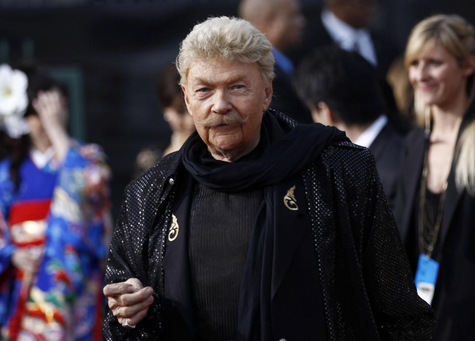 Rip Taylor arrives at the 16th Annual Critics' Choice Movie Awards in Los Angeles on Jan. 14, 2011. Taylor, the madcap, mustached comedian who became a television game show mainstay in the 1970s, died on Oct. 6. He was 88. (AP Photo/Matt Sayles)