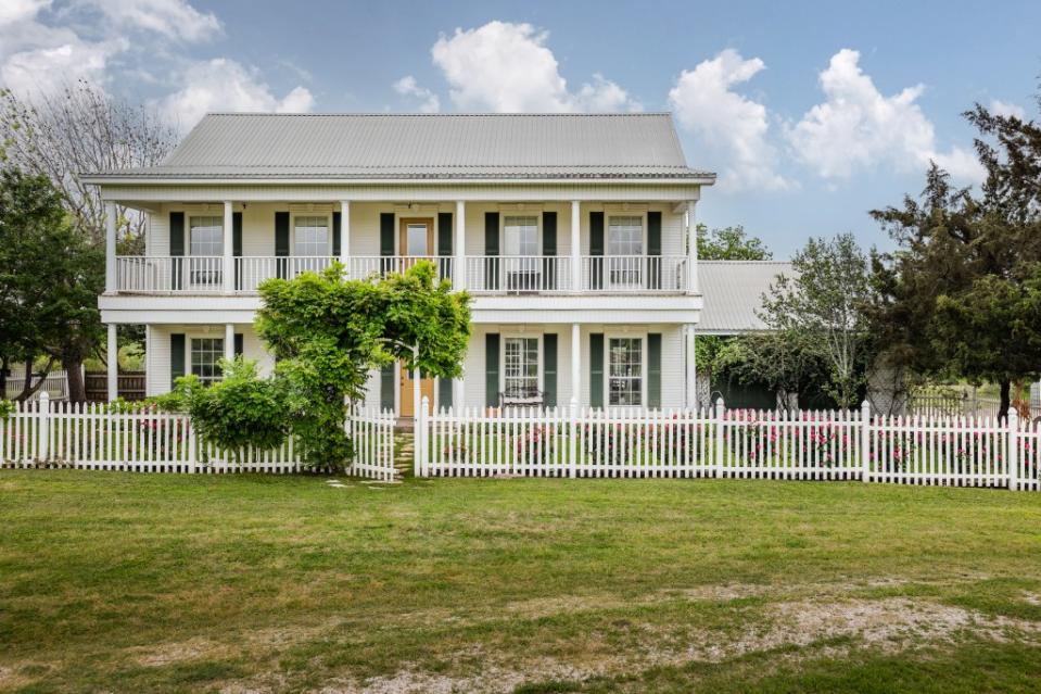 The home has more than 1,200 square feet of porches. Courtesy of James H. Ruiz Photography
