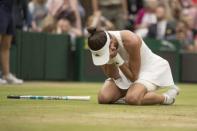 Jul 15, 2017; London, United Kingdom; Garbine Muguruza (ESP) celebrates match point during her women's finals match against Venus Williams (USA) on day twelve at the All England Lawn Tennis and Croquet Club. Mandatory Credit: Susan Mullane-USA TODAY Sports