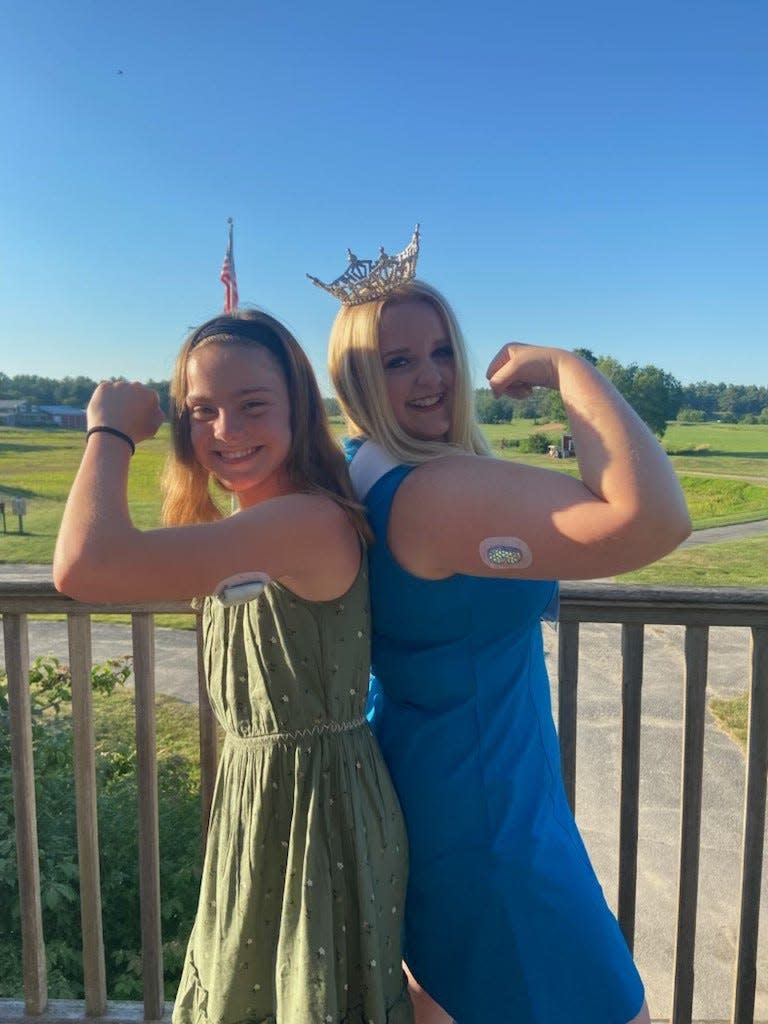 Miss Taunton 2023 Lily Jeswald, right, was diagnosed with Type 1 diabetes at the age of 4. Today she wears an insulin pump and a continuous glucose monitor, and is an advocate for Type 1 diabetes research. She's pictured here with one of the Lang sisters at the Four of a Kind For a Cure golf tournament to raise money for T1D in June.