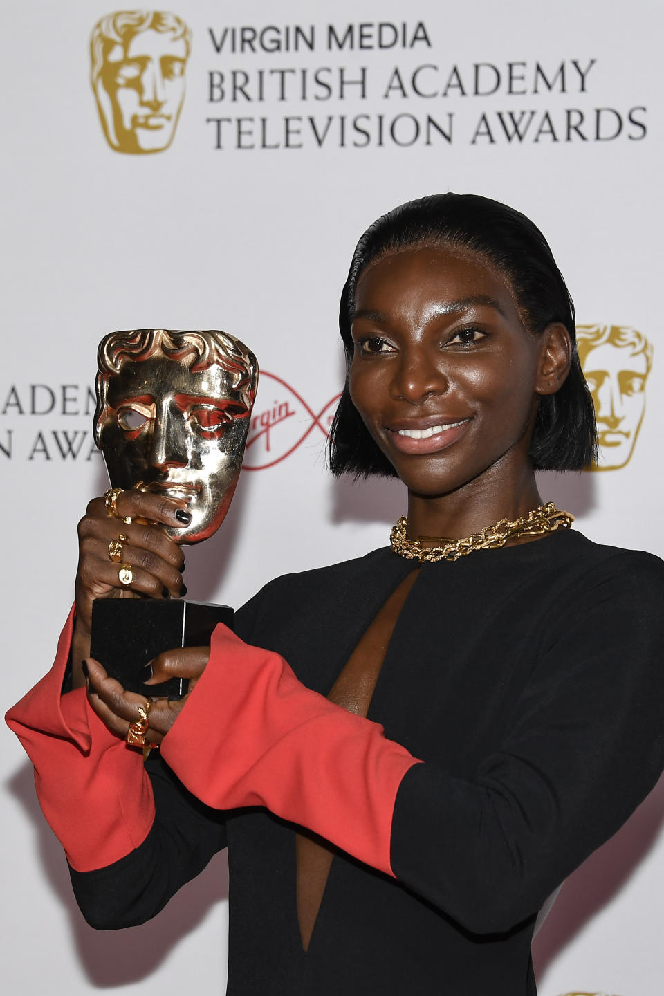 Michaela Coel poses for photographers with his Leading Actress award for her role in 'I May Destroy You' backstage at the British Academy Television Awards in London, Sunday, June 6, 2021. (AP Photo/Alberto Pezzali)