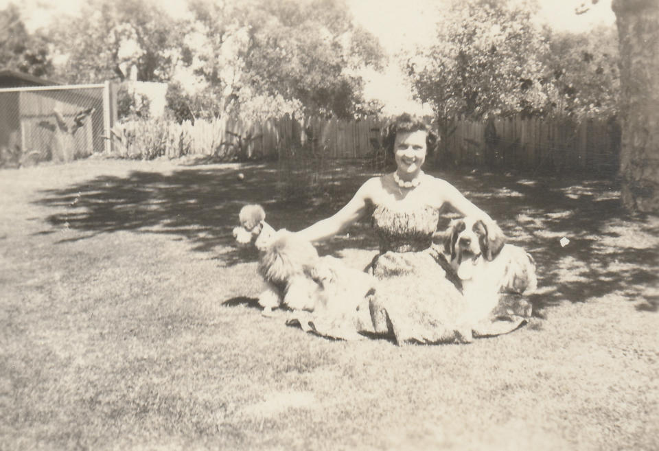 Betty White posing with her dogs