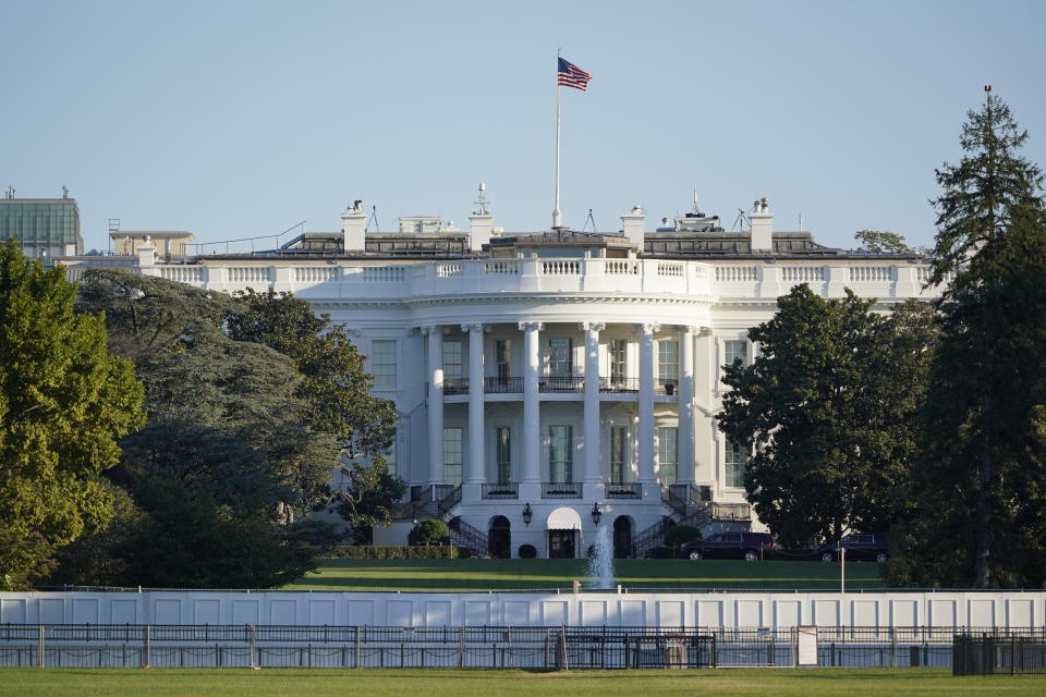 The White House is seen in Washington, early Saturday, Oct. 3, 2020, the morning after President Donald Trump was taken to a military hospital after being stricken by COVID-19. (AP Photo/J. Scott Applewhite)