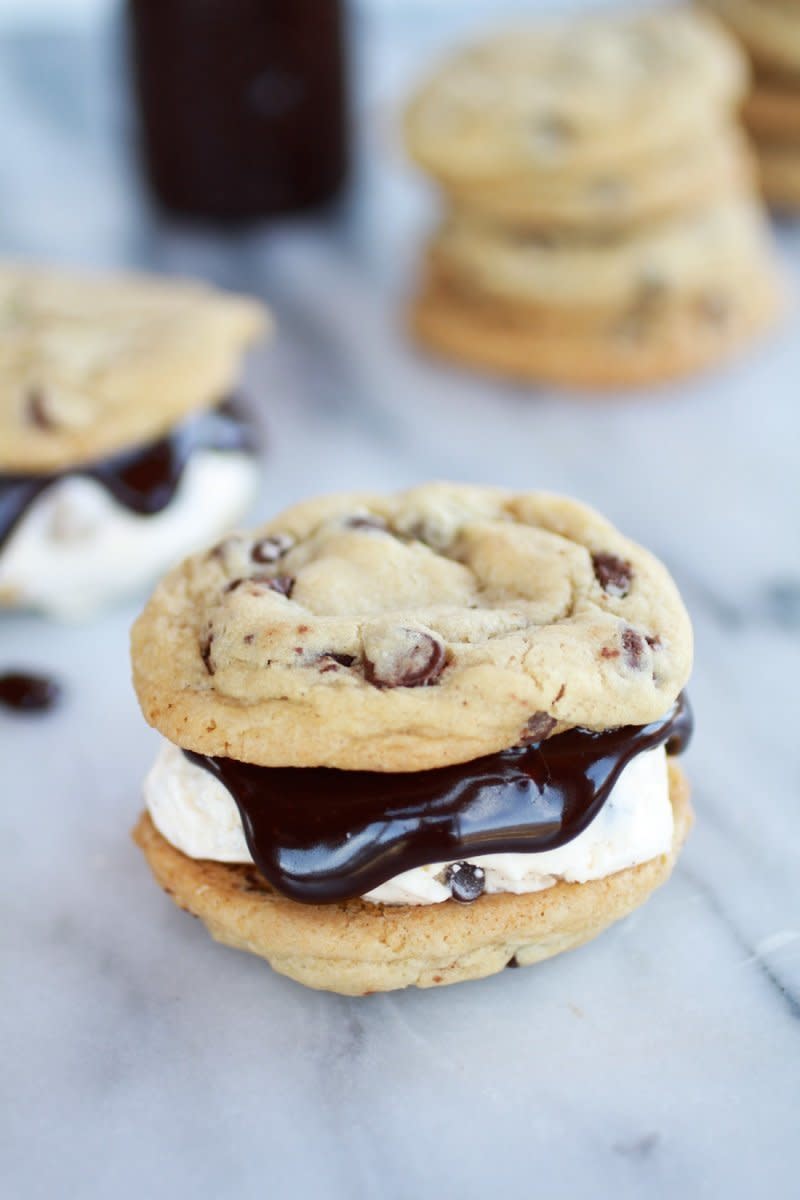 <strong>Get the <a href="http://www.halfbakedharvest.com/hot-fudge-chocolate-chip-cookie-cookie-dough-ice-cream-sandwich/" target="_blank">Hot Fudge Chocolate Chip Cookie Cookie Dough Ice Cream Sandwich recipe</a> from Half Baked Harvest</strong>