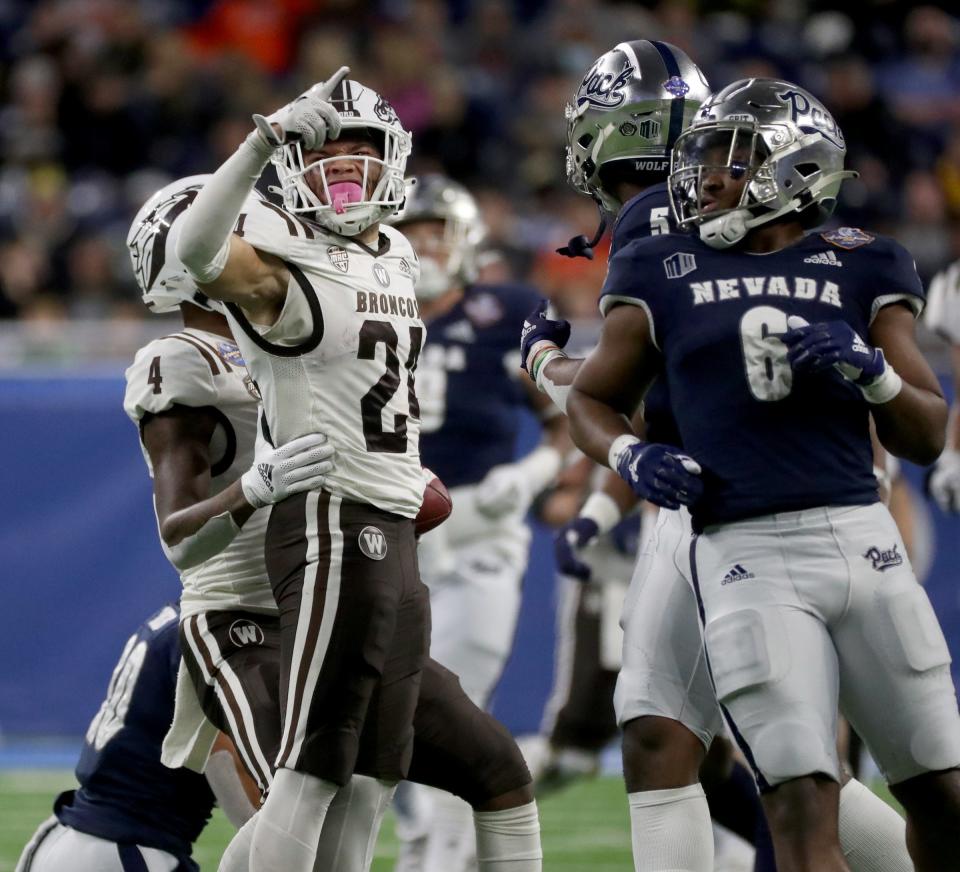 Western Michigan Broncos wide receiver Skyy Moore (24) picks up a first down against the Nevada Wolf Pack during first half action of the Quick Lane Bowl on Monday, Dec. 27, 2021, at Ford Field.