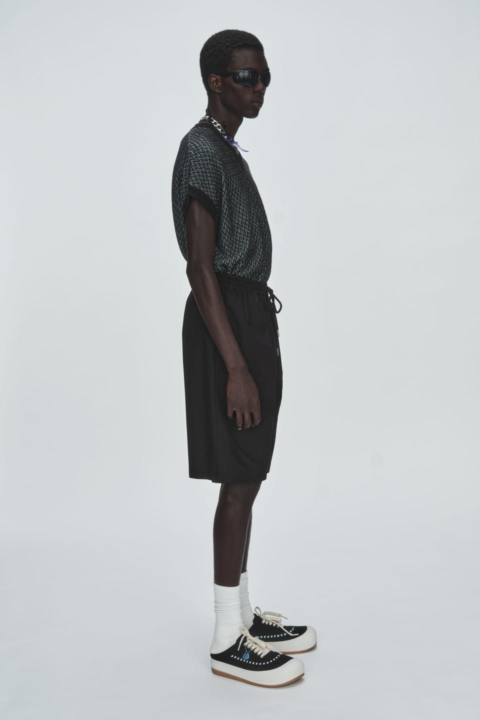 A look from Philippe Model Men's Spring 2025 with the "Big Model" shoes