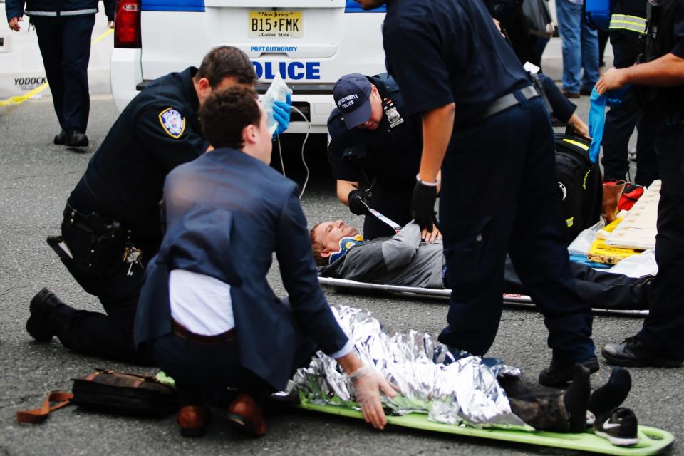 <p>First responders treat injured passengers after a New Jersey Transit train crashed into the platform at Hoboken Terminal during morning rush hour on Sept. 29, 2016 in Hoboken, New Jersey. (Eduardo Munoz Alvarez/Getty Images) </p>