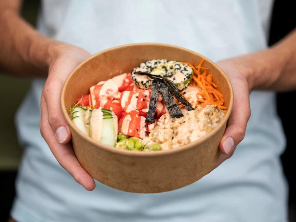 Researchers tested paper takeout food packaging and found that items such as compostable bowls contained PFAS or 'forever chemicals.' (Ben Nelms/CBC - image credit)