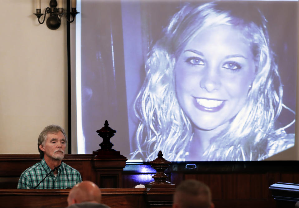 FILE - Dana Bobo, let, father of Holly Bobo, testifies in the trial of Zachary Adams as a photo of Holly Bobo is displayed Monday, Sept. 11, 2017, in Savannah, Tenn. Holly Bobo, a 20-year-old nursing student, disappeared from her home in Parsons, Tenn. on April 13, 2011, and Adams is charged with her kidnapping, rape and murder. Court documents show that Jason Autry, the star trial witness in the killing of Holly Bobo, a 20-year-old nursing student who disappeared from her rural Tennessee home in 2011, is recanting his testimony. (AP Photo/Mark Humphrey, Pool, File)