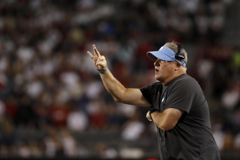 UCLA coach Chip Kelly gestures during the second half of the team's NCAA college football game against Arizona on Saturday, Oct. 9, 2021, in Tucson, Ariz. (AP Photo/Chris Coduto)