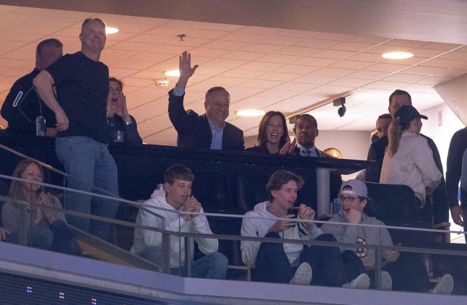 Vice President Kamala Harris and her husband, Douglas Emhoff, watch a first-round college basketball game between Kansas and Howard in the NCAA Tournament Thursday, March 16, 2023, in Des Moines, Iowa.