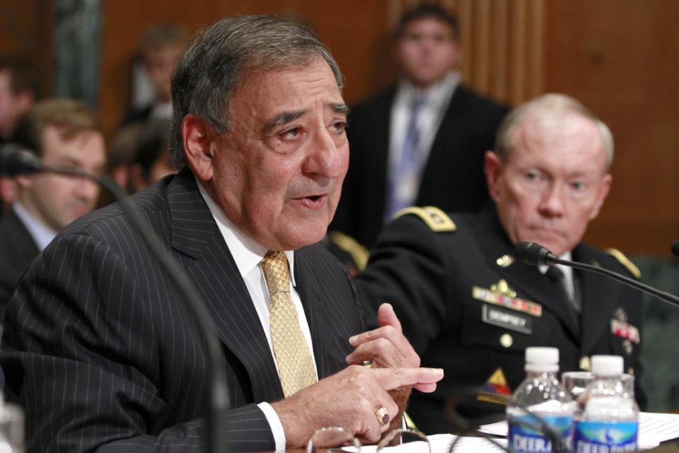 Defense Secretary Leon Panetta, left, accompanied by Joint Chefs Chairman Gen. Martin Dempsey testifies on Capitol Hill in Washington, Wednesday, June 13, 2012, before the Senate Defense subcommittee hearing on the the Defense Department's fiscal 2013 budget. (AP Photo/Jacquelyn Martin)