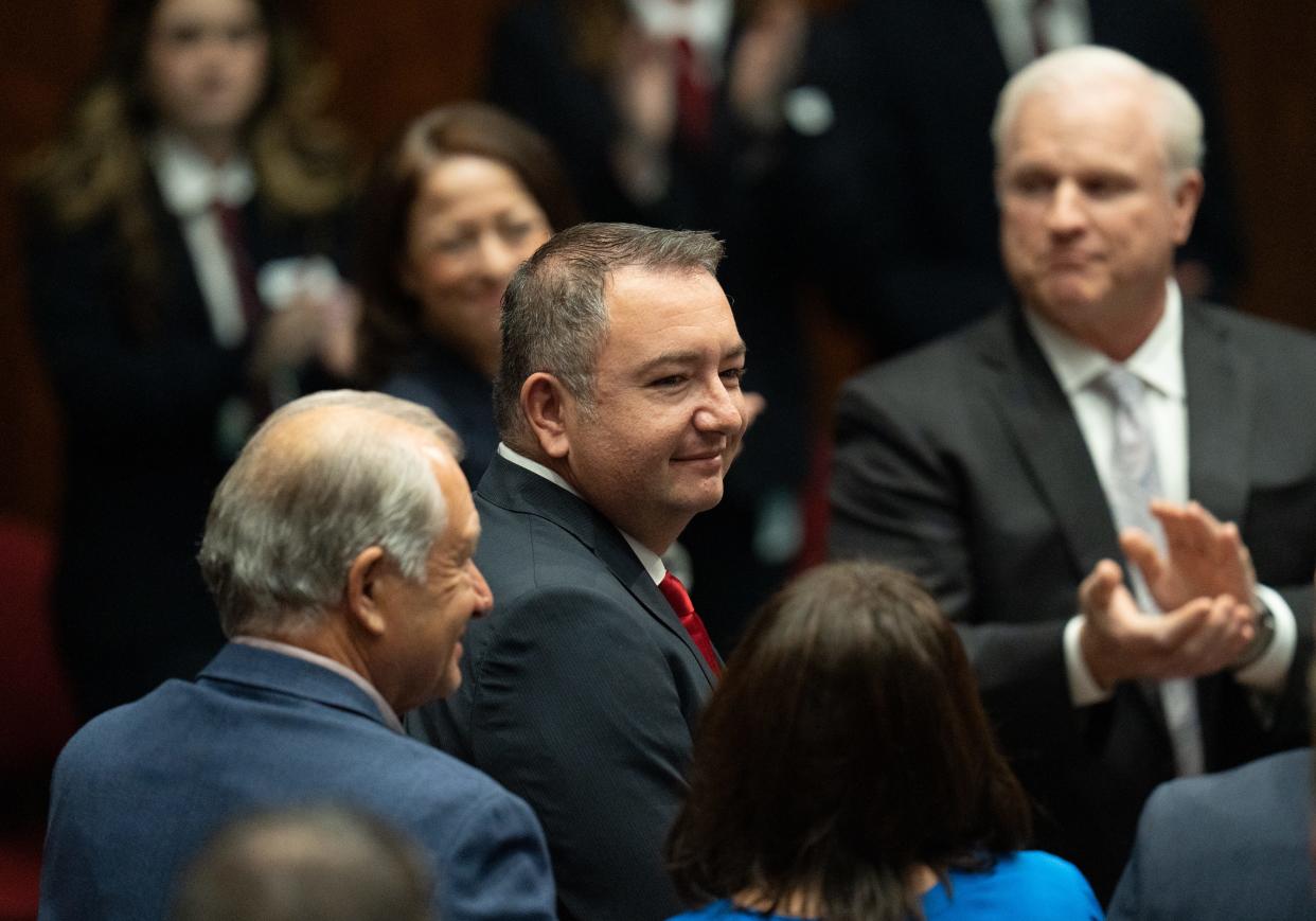 Rep. Ben Toma (center) after being elected speaker of the House during the opening day ceremony in the Arizona House of Representatives on Jan. 9, 2023, in Phoenix.