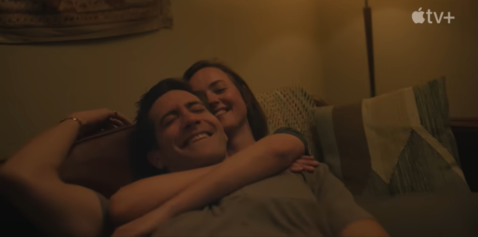 presumed innocent trailer, Jake Gyllenhaal and Renate Reinsve are lying on a couch with their arms around each other