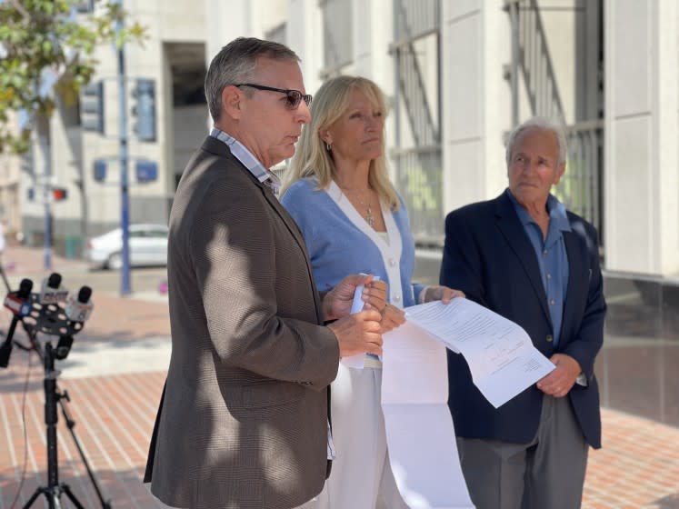 Marc Klass, Anne Hyde and Steve Herr speak to protestors at the recall Gov. Gavin Newsom press event on August 11, 2021.