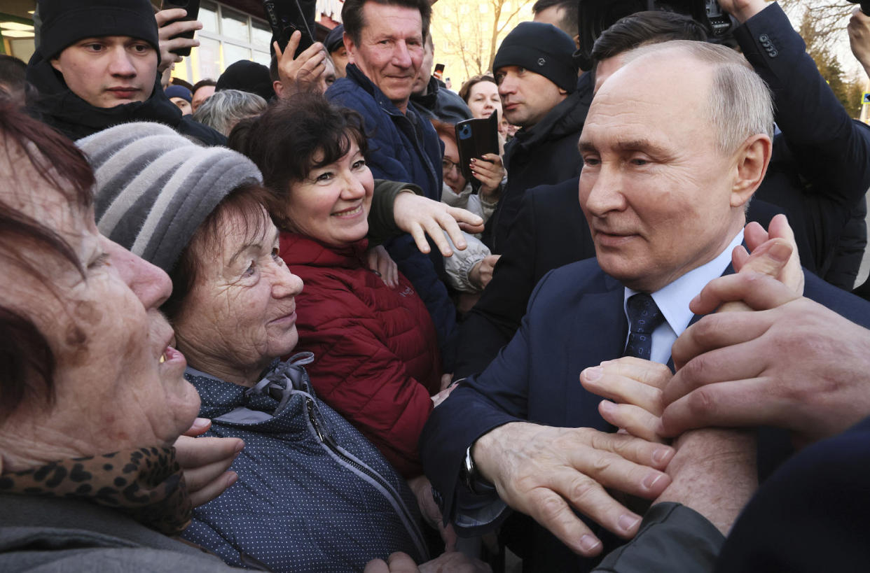 Putin is poised to sweep to another six-year term in the March 15-17 presidential election, relying on his rigid control of the country established during his 24 years in power — the longest Kremlin tenure since Soviet leader Josef Stalin. (Mikhail Metzel / Kremlin Pool via AP)