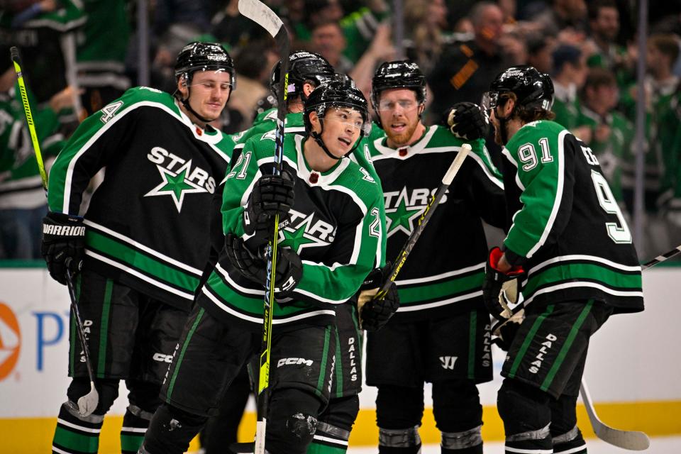 Dallas Stars left wing Jason Robertson (21) and center Roope Hintz (24) and center Joe Pavelski (16) and center Tyler Seguin (91) celebrates Robertson scoring the game tying  goal against the Winnipeg Jets during the third period at the American Airlines Center in Dallas on Nov. 25, 2022.