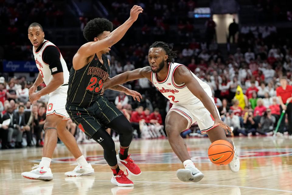 Ohio State guard Bruce Thornton drives past Wisconsin guard Chucky Hepburn.