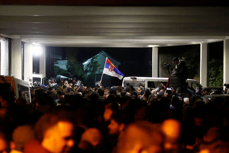 Protesters briefly broke into Serbia's state television building during a protest against Serbian President Aleksandar Vucic and his government in central Belgrade, Serbia, March 16 , 2019. REUTERS/Djordje Kojadinovic