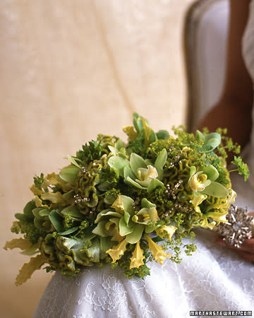 <div class="caption-credit"> Photo by: Con Poulos</div><b>Sparkling Wedding Bouquet <br></b> <br> In a gilded cascade, beaded florets, strung by hand, glint like tiny holiday lights amid cymbidium orchids, bupleurum, gloriosa lilies, and lady's mantle; velvety gold-tipped cockscomb lend their own luster. The stems are wrapped in a wide gold band of satin ribbon and adorned a rhinestone brooch. <br> <br> <b>Plus:</b> <a href="http://www.marthastewartweddings.com/301886/expert-advice-financial-planners?xsc=synd_yshine" rel="nofollow noopener" target="_blank" data-ylk="slk:Budgeting Tips for Newlyweds;elm:context_link;itc:0;sec:content-canvas" class="link ">Budgeting Tips for Newlyweds</a>