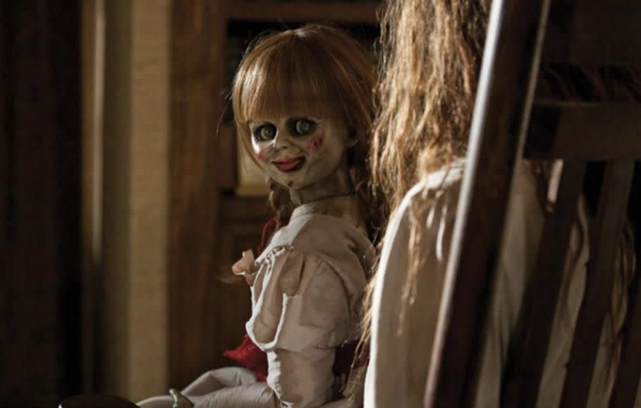 A UK-based woman has is being 'haunted' by her own Annabelle-style doll which is 100-years-old. Source: New Line Cinema