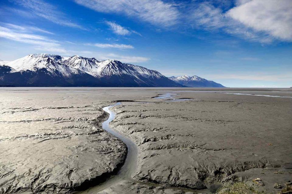 <p>Planet One Images/Universal Images Group via Getty Images</p> Turnagain Arm mud flats