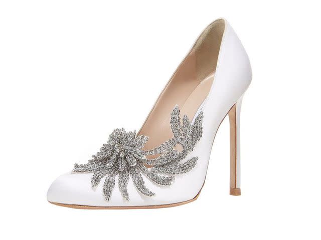 <p>Neiman Marcus</p> Bella Swan's Manolo Blahnik white satin bridal shoes
