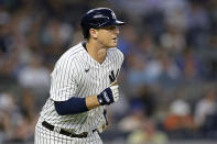 New York Yankees' DJ LeMahieu watches his home run against the Detroit Tigers during the first inning of a baseball game Tuesday, Sept. 5, 2023, in New York. (AP Photo/Adam Hunger)