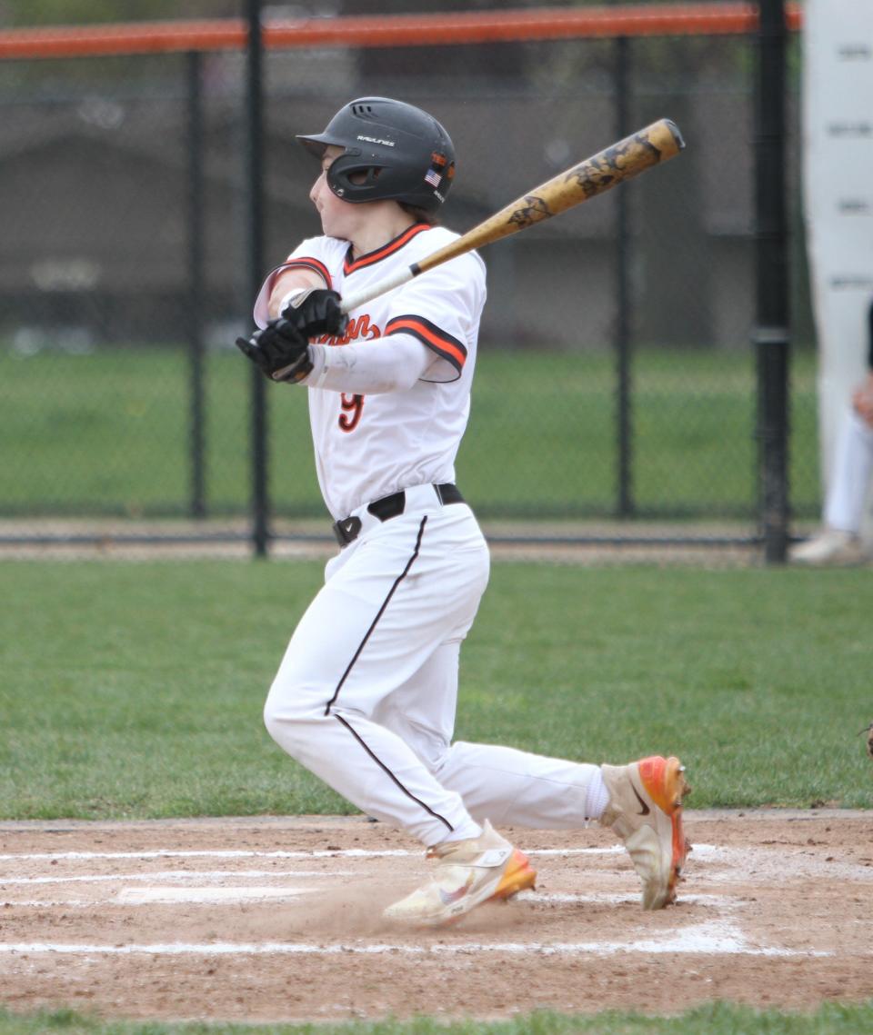 Brighton's Carter Gregg gets a hit during a 12-2 loss to Howell on Monday, May 8, 2023.