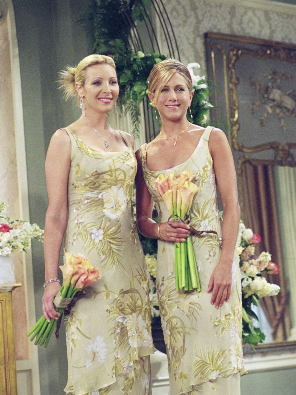 <p>Not only did Phoebe and Rachel look great as bridesmaids on <em>Friends</em>, but their sleeveless floral gowns are totally on trend for the moment. </p>