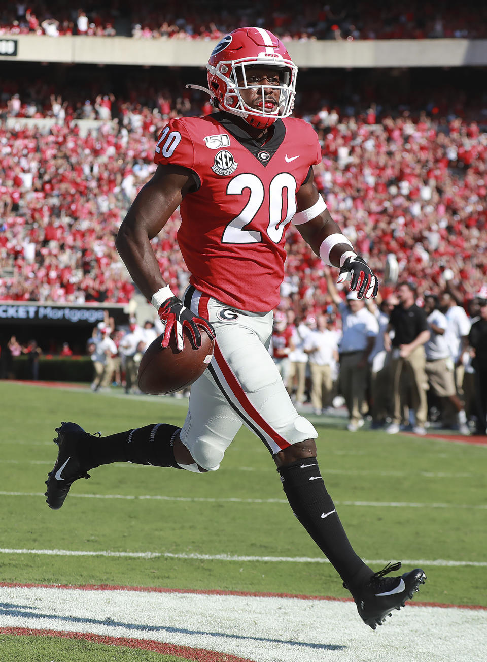 Georgia defensive back J.R. Reed returns a Murray State fumble for a touchdown during the first half of an NCAA college football game Saturday, Sept. 7, 2019, in Athens, Ga. (Curtis Compton/Atlanta Journal Constitution via AP)