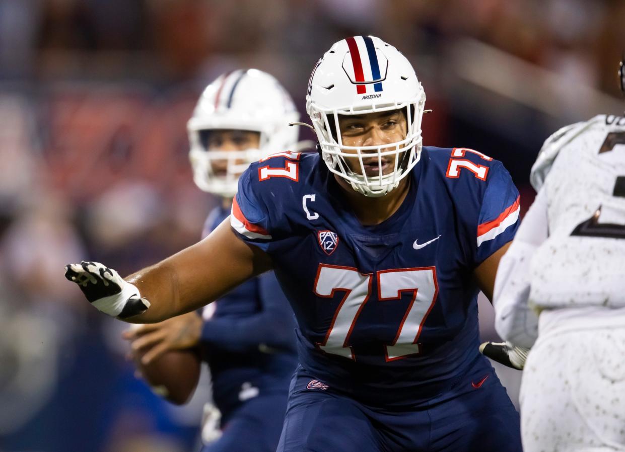 Oct 8, 2022; Tucson, Arizona, USA; Arizona Wildcats offensive lineman Jordan Morgan (77) against the Oregon Ducks at Arizona Stadium. Mandatory Credit: Mark J. Rebilas-USA TODAY Sports