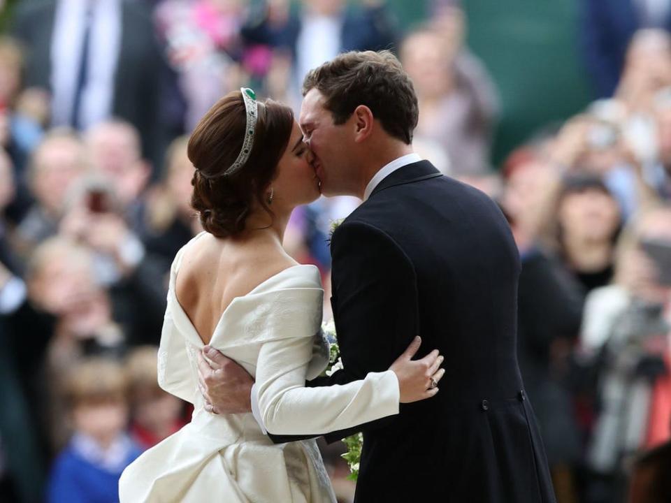 Princess Eugenie and Jack Brooksbank kiss on their wedding day in 2018.