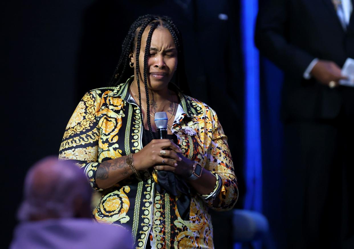 Lucretia McKinney, a former student athlete, speaks during a remembrance ceremony for Dr. Kenneth Wayne Blair, Sr., known as Santa Blair, at Life Church in Edmond, Okla. Saturday, April 6, 2024.