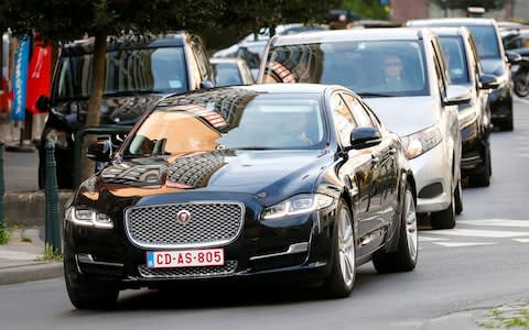 The car believed to be carrying Britain's Secretary of State for Exiting the EU Raab arrives at the EU Commission headquarters in Brussels - Credit: Reuters