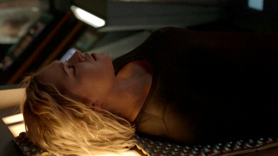 Clarke laying down with mascara on