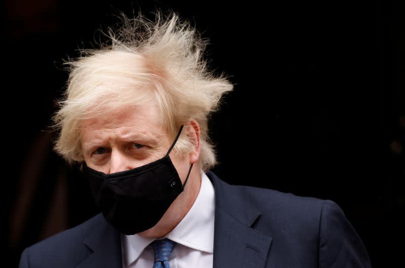 Britain's PM Johnson outside Downing Street in London