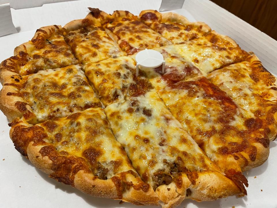 A large half sausage and half pepperoni pizza from Guido's in downtown Ravenna.