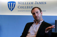 Travis Bickford, Associate Director of Military and Veteran Relations, speaks to Reuters at William James College of Psychology, the first in the nation to run a program focusing specifically on training military veterans to treat the mental health problems of their fellow soldiers and veterans, in Newton, Massachusetts, U.S., May 16, 2017. REUTERS/Brian Snyder