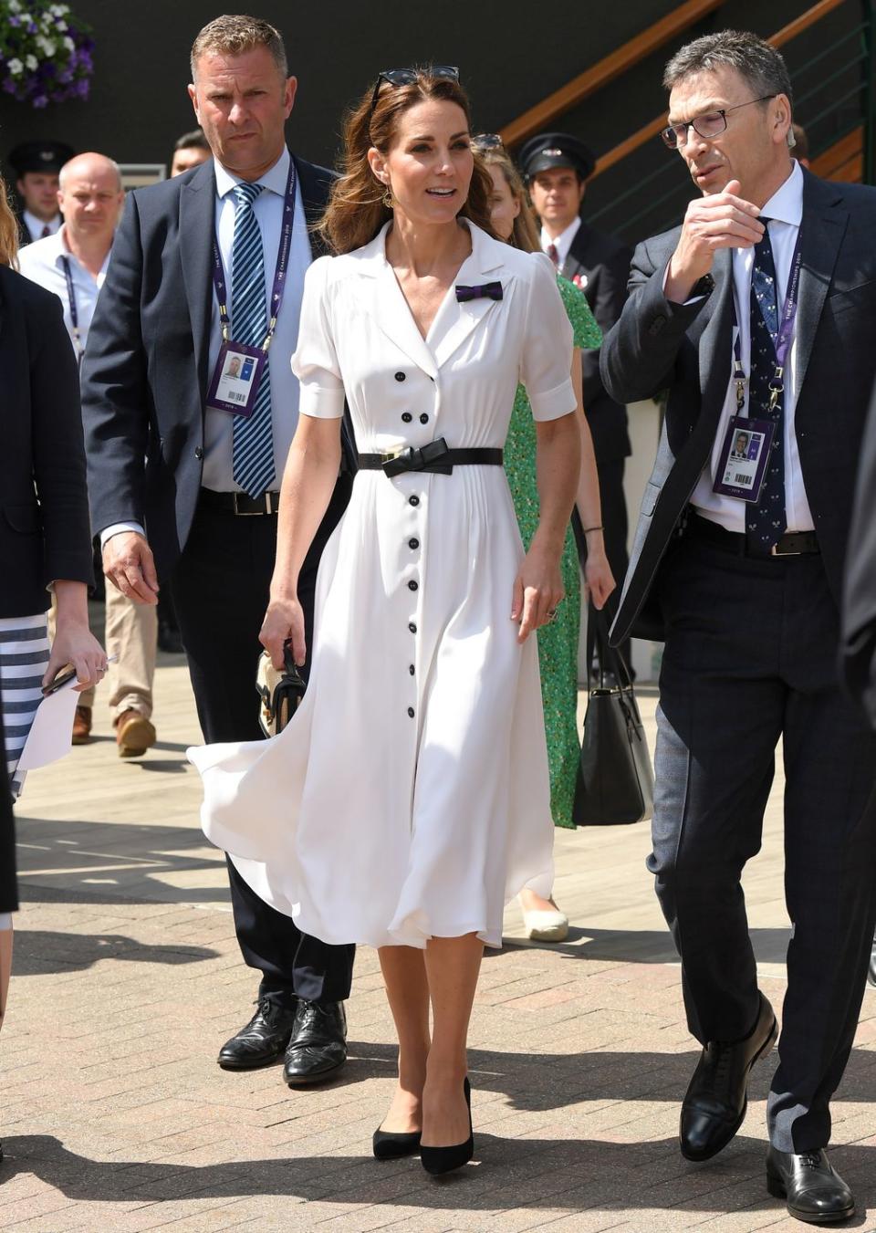 <p>The Duchess of Cambridge arrives at Wimbledon wearing an elegant black and white look.</p>