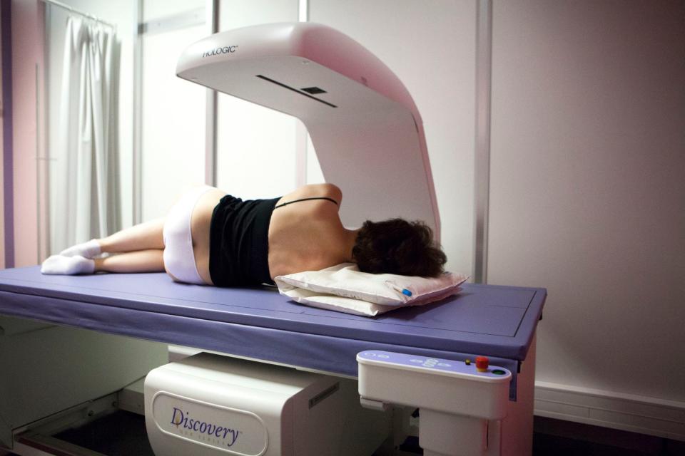 woman in DEXA scanner