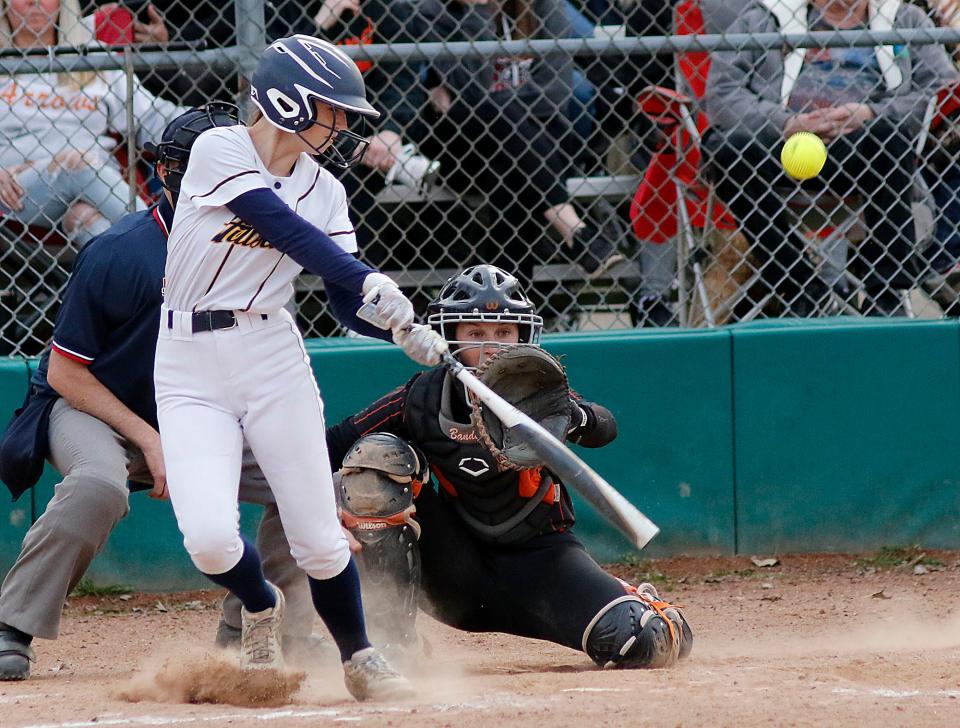 Hillsdale High School's Jacey Sermulis (13) bats against Ashland High School during high school softball action in the 29th annual Wendy's Spring Classic at Brookside Main on Friday, April 15, 2022. TOM E. PUSKAR/TIMES-GAZETTE.COM