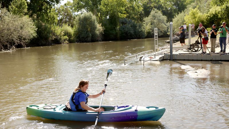 Courtney Custer kayaks in the Jordan River at Pioneer Crossing Regional Park in West Valley on Thursday, July 20, 2023.